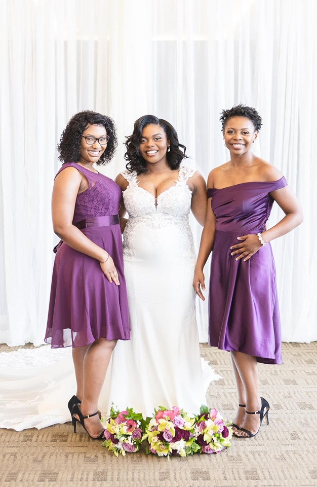 photo of wedding bride and bridesmaids in cross insurance center