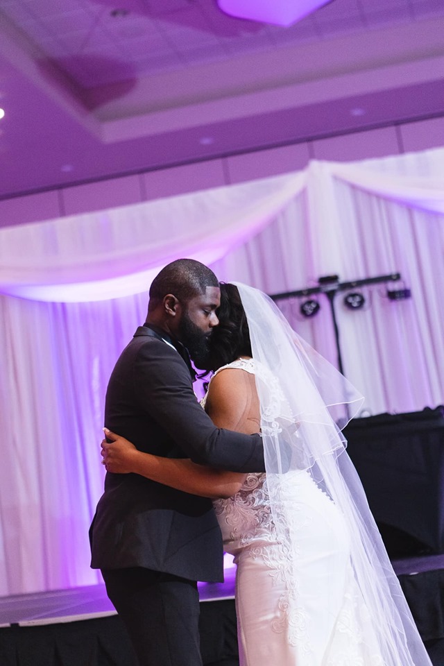 photo of bride and groom sharpe wedding hosted by the cross insurance center in the ballroom